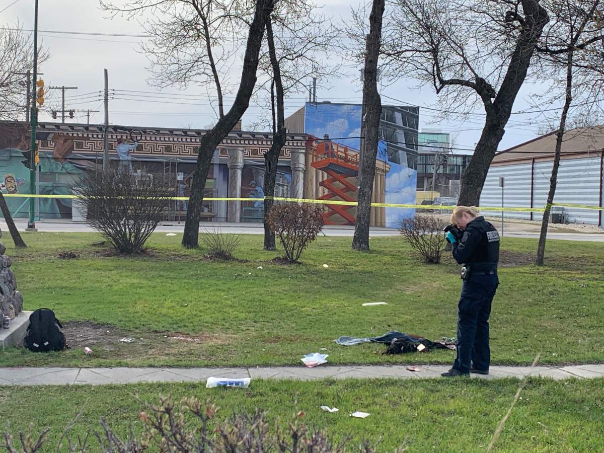 Officers at the scene of an overnight stabbing on Higgins Avenue Tuesday, May 5, 2020.