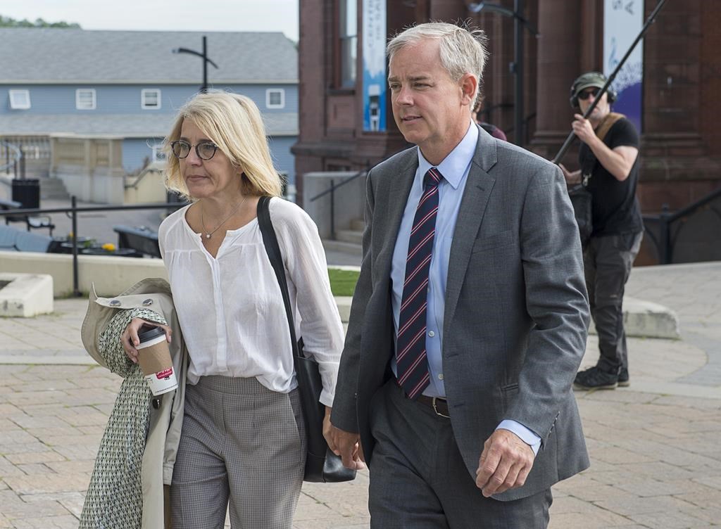 Dennis Oland and his wife Lisa arrive at the Law Courts in Saint John, N.B., on Friday, July 19, 2019. 