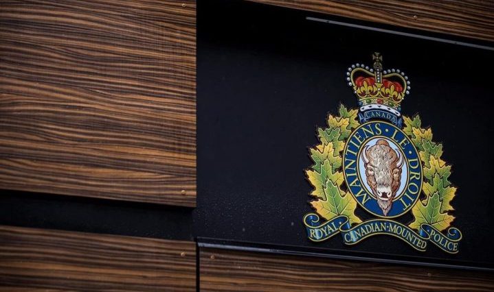 The RCMP logo is seen outside Royal Canadian Mounted Police "E" Division Headquarters, in Surrey, B.C., on Friday April 13, 2018. T.