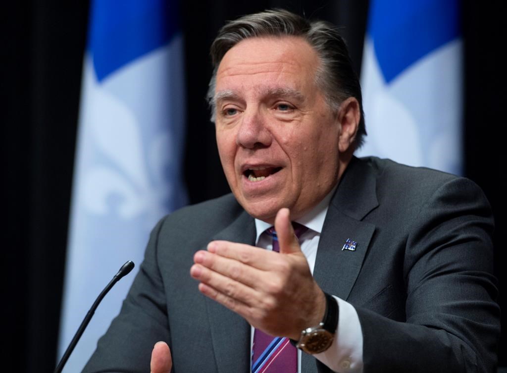 Quebec Premier François Legault responds to reporters during a news conference on the COVID-19 pandemic, Monday, May 11, 2020 at the legislature in Quebec City.