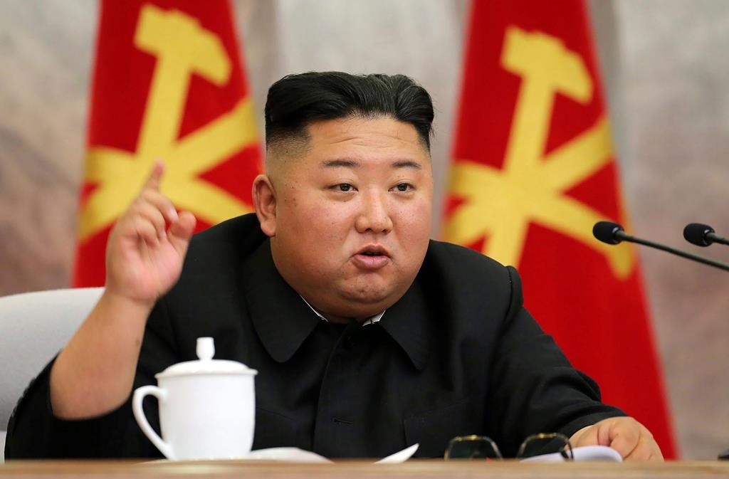 In this undated photo provided on Sunday, May 24, 2020, by the North Korean government, North Korean leader Kim Jong Un speaks during a meeting of the Seventh Central Military Commission of the Workers' Party of Korea in North Korea. Independent journalists were not given access to cover the event depicted in this image distributed by the North Korean government. The content of this image is as provided and cannot be independently verified.