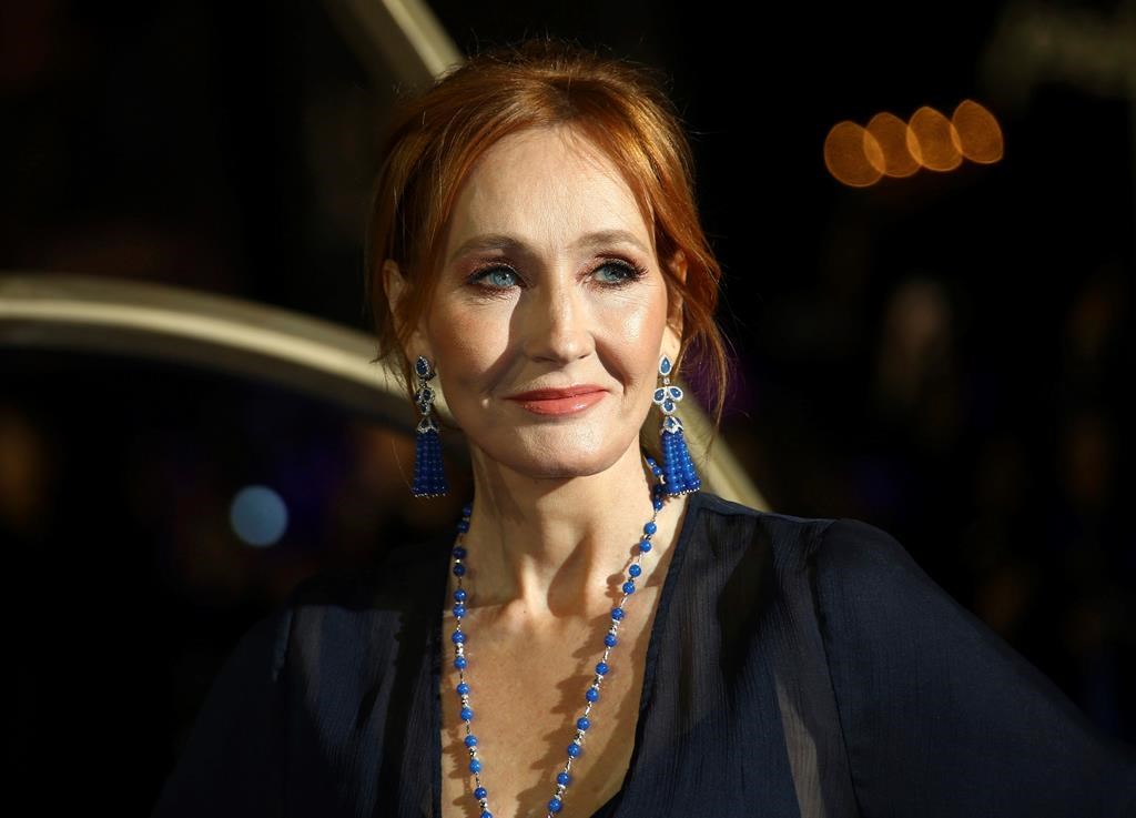 In this Nov. 13, 2018 file photo, author J.K. Rowling poses for photographers upon her arrival at the premiere of the film 'Fantastic Beasts: The Crimes of Grindelwald', in London. JK Rowling is publishing a new story called “The Ickabog,” which will be free to read online to help entertain children and families stuck at home during the coronavirus pandemic. The “Harry Potter” author said Tuesday May 26, 2020, that she wrote the fairy tale for her children as a bedtime story over a decade ago.
