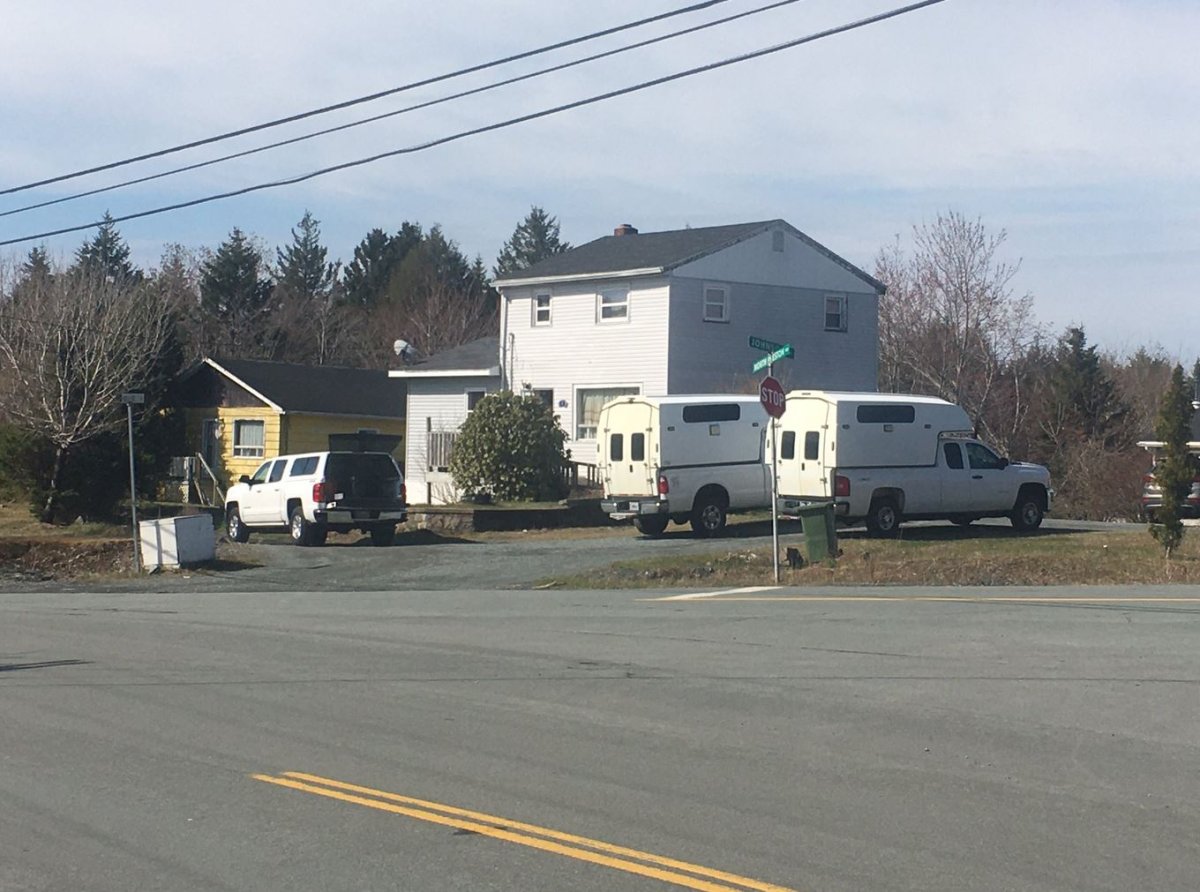 A forensic team at a home in North Preston, N.S., on Friday, May 8, 2020. 