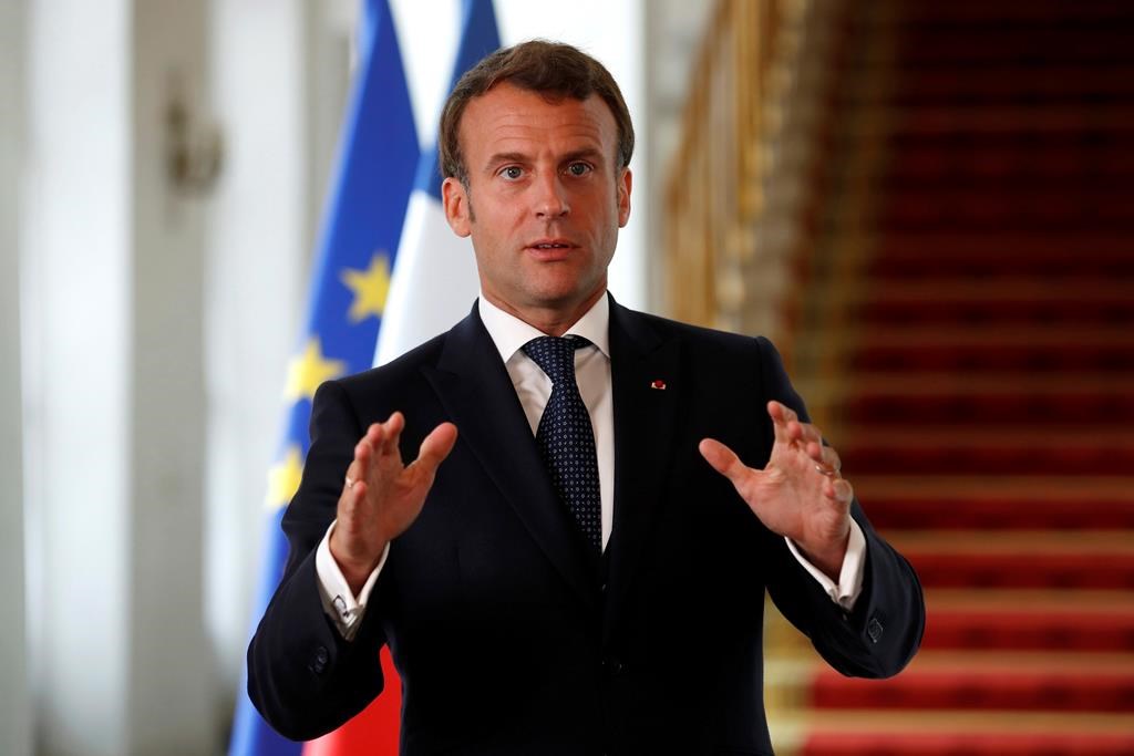 French President Emmanuel Macron speaks after a video-conference summit on vaccination at the Elysee Palace in Paris, Monday, May 4, 2020.