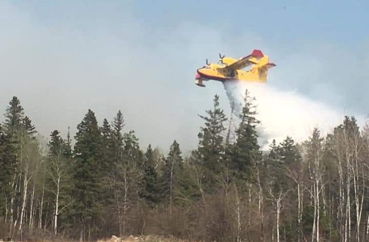 A water bomber near Pine Creek First Nation Wednesday.