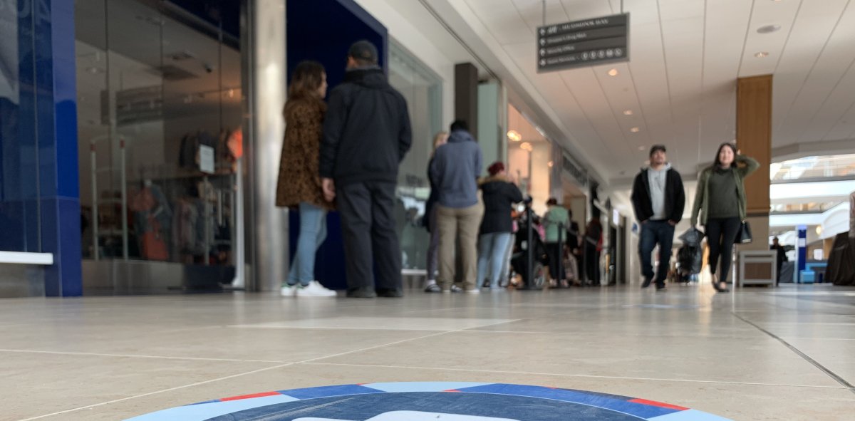 Shoppers are seen at Polo Park mall in this file photo. 