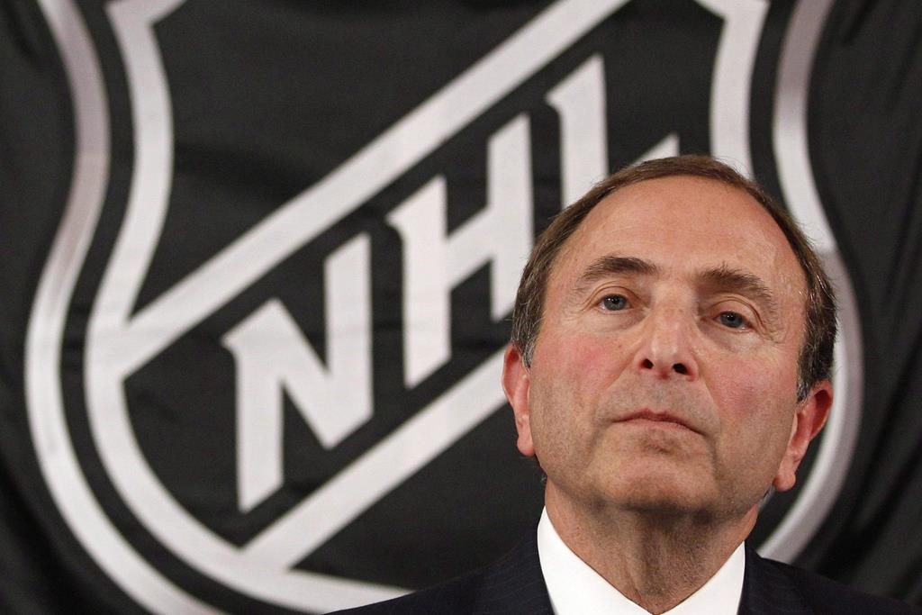 In this Sept. 13, 2012, file photo, NHL commissioner Gary Bettman listens as he meets with reporters after a meeting with team owners in New York.