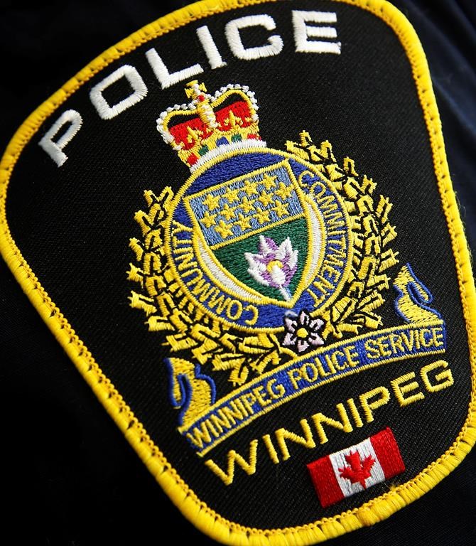 Photo of a Winnipeg Police Service shoulder badge on an officer in Winnipeg Tuesday, November 5, 2019. THE CANADIAN PRESS/John Woods.