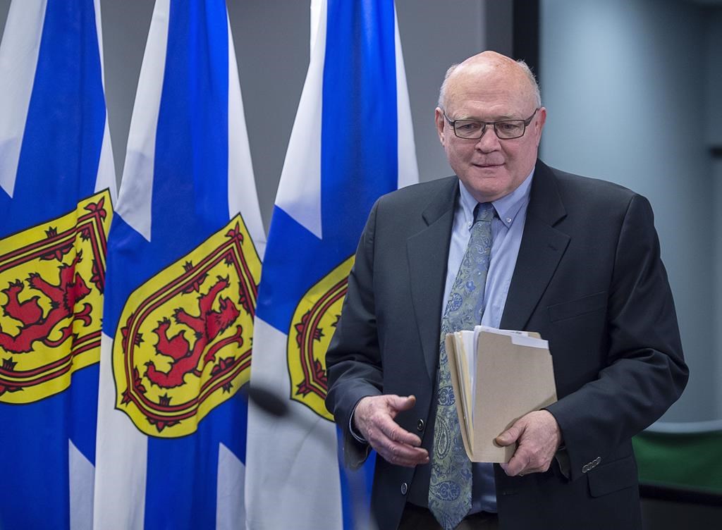 Dr. Robert Strang, chief medical officer of health, arrives to deliver an update on health system preparations in Nova Scotia for the coronavirus that causes COVID-19, in Halifax on Friday, March 6, 2020.