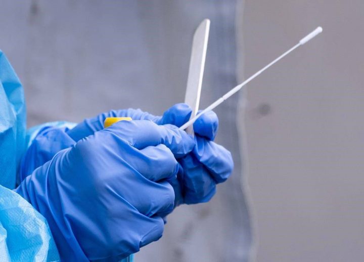 A nurse gets a swab ready at a temporary COVID-19 test clinic in Montreal, on Friday, May 15, 2020. 