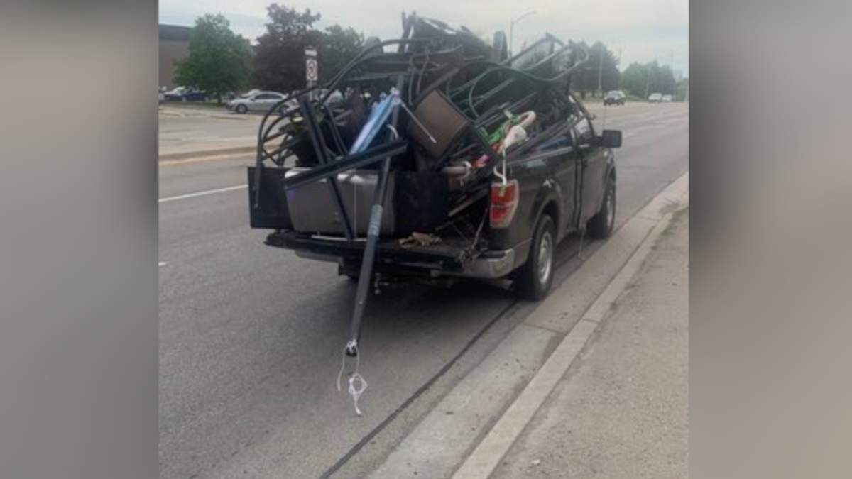 A driver is facing multiple charges after driving his overloaded vehicle on a busy thoroughfare in Burlington on Thursday night. 
