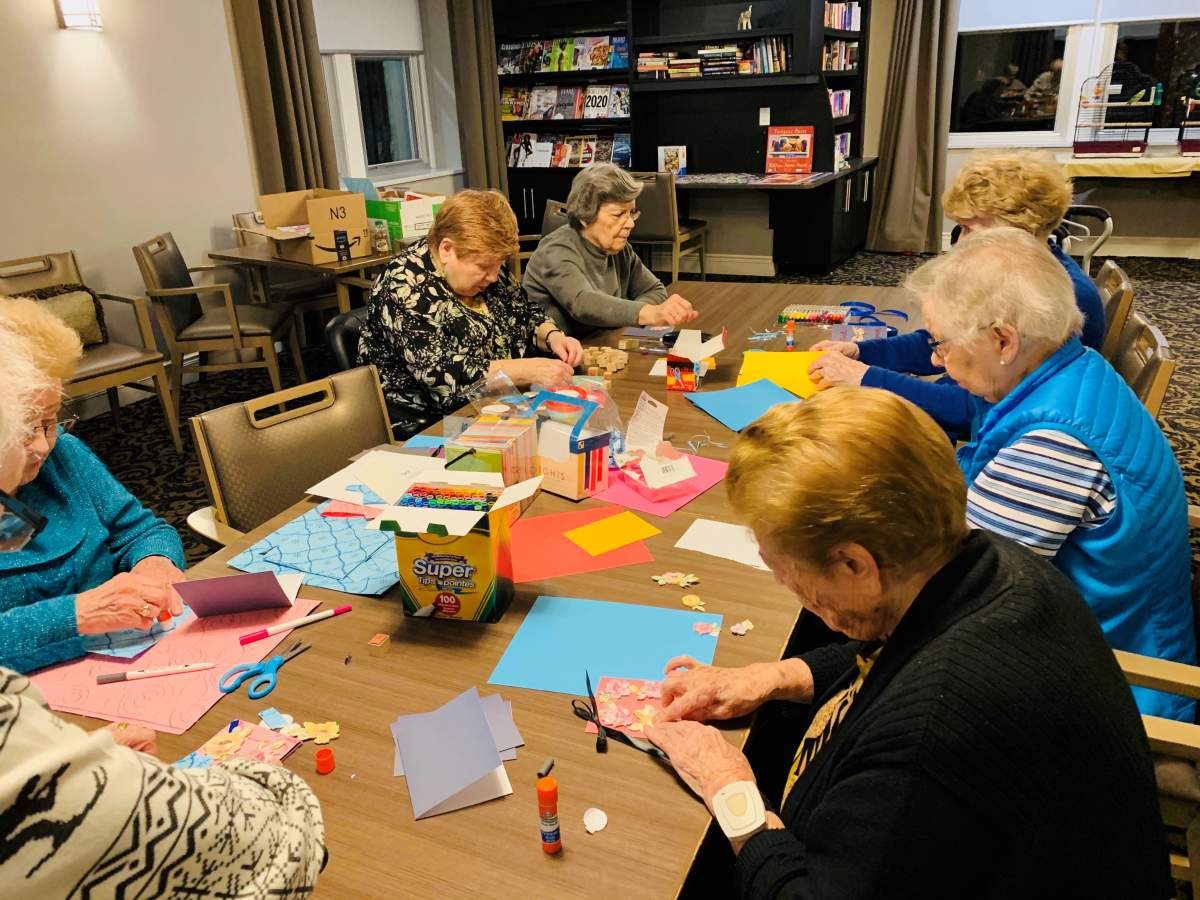 Seniors make cards pre-COVID-19 through the Seniors with Skills card-making program.