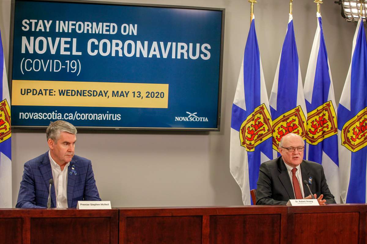 Nova Scotia Premier Stephen McNeil and chief public health officer Dr. Robert Strang speaks at a press briefing in Halifax on Wednesday, May 13, 2020. 