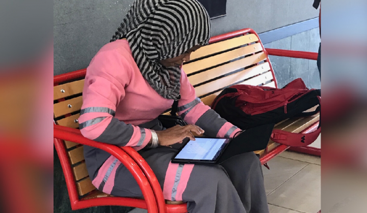 Dehab, a young refugee woman who came to Saskatoon alone, joins an online women’s group for the first time after receiving a tablet and training.