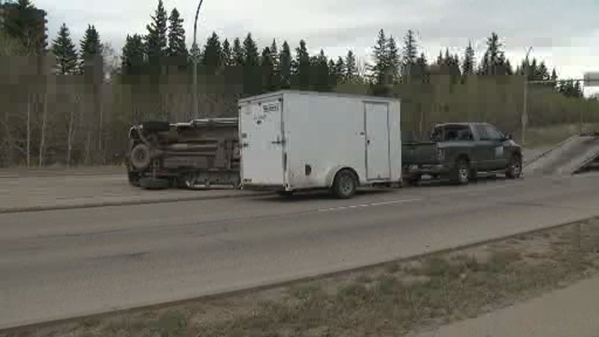 Edmonton police investigate a rollover involving a stolen vehicle in the area of 122 Street and Whitemud Drive Thursday, May 14, 2020.
