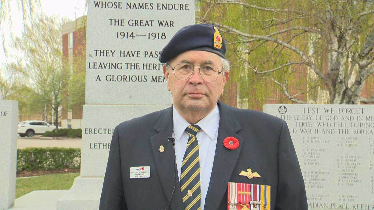 Retired Air Force officer Wayne King stands by the cenotaph in Lethbridge as he commemorates the 75th anniversary of the end of the Second World War.