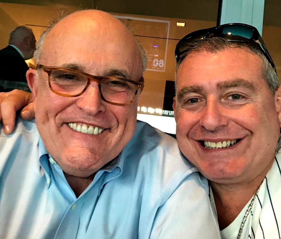 This undated image released by the House Judiciary Committee from documents provided by Lev Parnas to the committee in the impeachment probe against President Donald Trump, shows a photo of Lev Parnas with Rudy Giuliani. Parnas, a close associate of Trump’s personal lawyer Giuliani is claiming Trump was directly involved in the effort to pressure Ukraine to investigate Democratic rival Joe Biden. Trump on Thursday, Jan. 16, 2020, repeated denials that he is acquainted with Parnas, despite numerous photos that have emerged of the two men together.(House Judiciary Committee via AP)