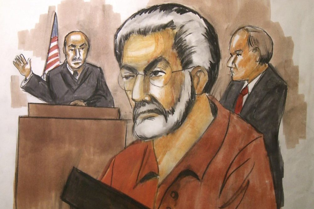 FILE - In this Jan. 6, 2010, file courtroom artist's drawing Chicago businessman Tahawwur Rana, center, appears before Judge Matthew Kennelly in Chicago's federal court. Rana, a Pakistani-born Canadian, was convicted of a crime related to the Mumbai killings that are sometimes called India's 9/11, though U.S. prosecutors had failed to prove a terrorism charge that connected him directly to the three-day rampage during his 2011 trial. Rana who spent more than 10 years in prison for supporting terrorist groups has been arrested in Los Angeles to face charges in India for attacks in Mumbai in 2008 that killed more than 160 people, U.S. prosecutors said Friday, June 19, 2020. 