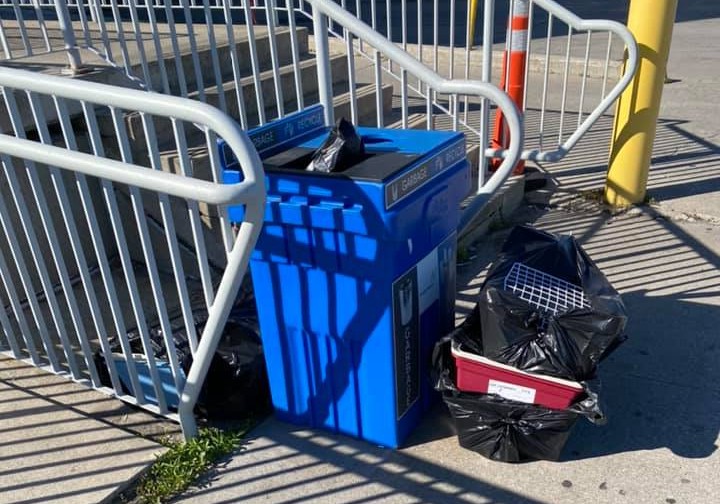 Abby Lorenzen reportedly saw puppy paws sticking out from the garbage as she was leaving.