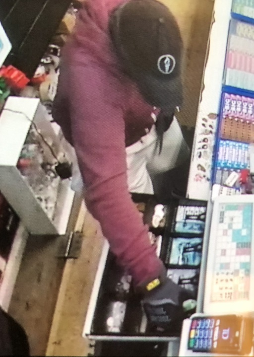 Kingston police are looking for the man in this photo, who allegedly stole cash from a Kingston convenience store.