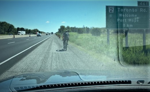 Northumberland OPP have charged a cyclist after he allegedly travelled on Highway 401.