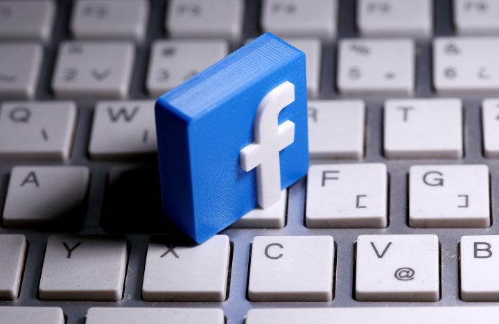 FILE PHOTO: A 3D-printed Facebook logo is seen placed on a keyboard in this illustration taken March 25, 2020. 