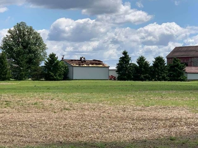 Glencoe-area resident Kelly Janssen says her husband and son were in the workshop with two others when the storm ripped off half of the roof.