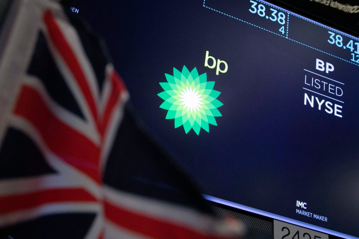 The logo for BP appears above a trading post on the floor of the New York Stock Exchange, Tuesday, Oct. 29, 2019. Stocks are off to a slightly lower start on Wall Street as communications and energy companies fall. (AP Photo/Richard Drew).