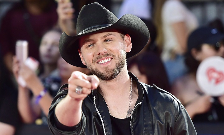 Brett Kissel arrives on the red carpet at the iHeartRadio MMVAs in Toronto on Aug. 26, 2018. 