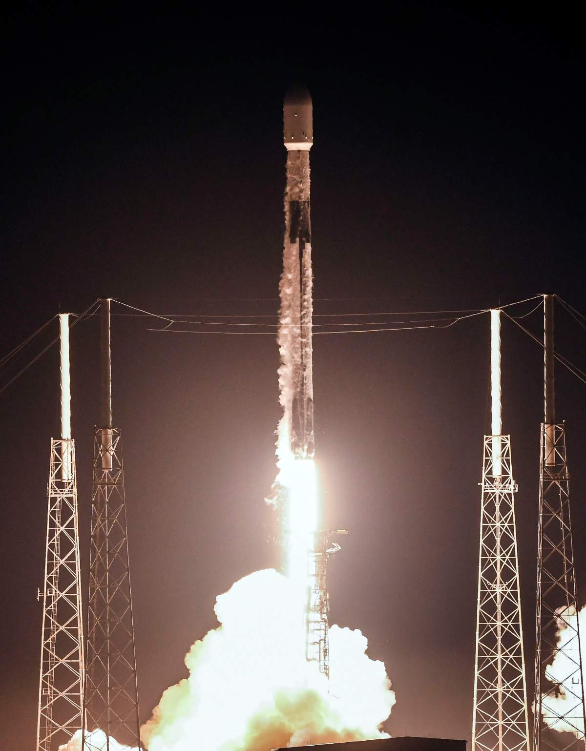 A SpaceX Falcon 9 lifts off from Complex 40 at Cape Canaveral in Florida on Wednesday, June 3, 2020. The rocket is carrying 60 Starlink communications satellites.