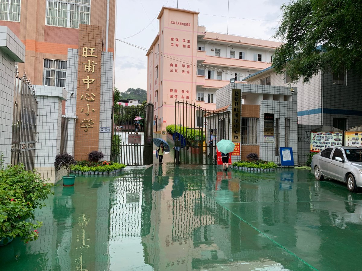 epa08464628 A view of an entrance to a primary school where a school security guard has injured at least 39 people in a knife attack in Cangwu County, Guangxi province, China, 04 June 2020. State media reports on 04 June a knife wielding school security guard has injured at least 39 people, 37 children and two adults, at a primary school in southern China's Guangxi region.  EPA/STR CHINA OUT.
