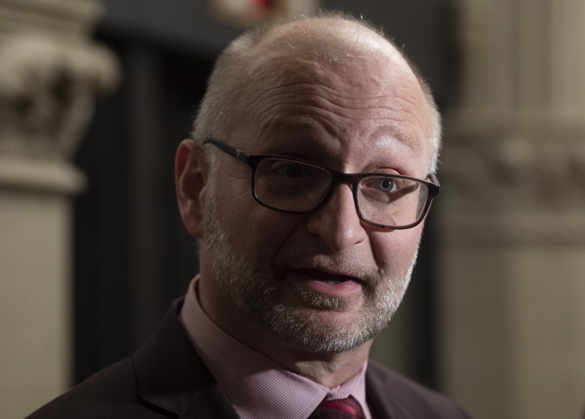 Minister of Justice and Attorney General of Canada David Lametti speaks with the media following a cabinet meeting on Parliament Hill in Ottawa, Tuesday, February 25, 2020.