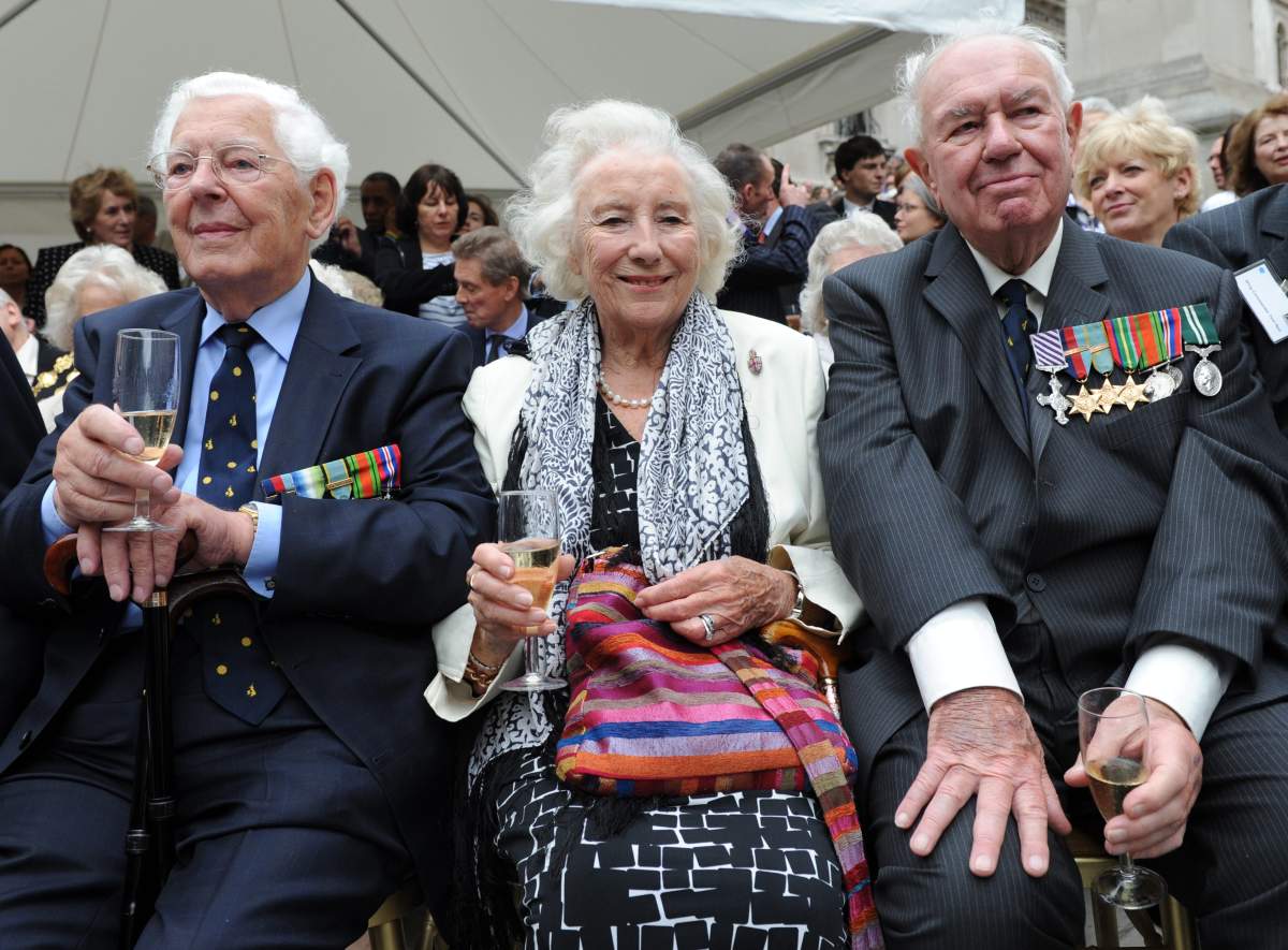 Battle of Britain veterans pose for photos with Dame Vera Lynn (C) outside the Churchill War Rooms, in London, England, Britain, on Aug. 20, 2010.
