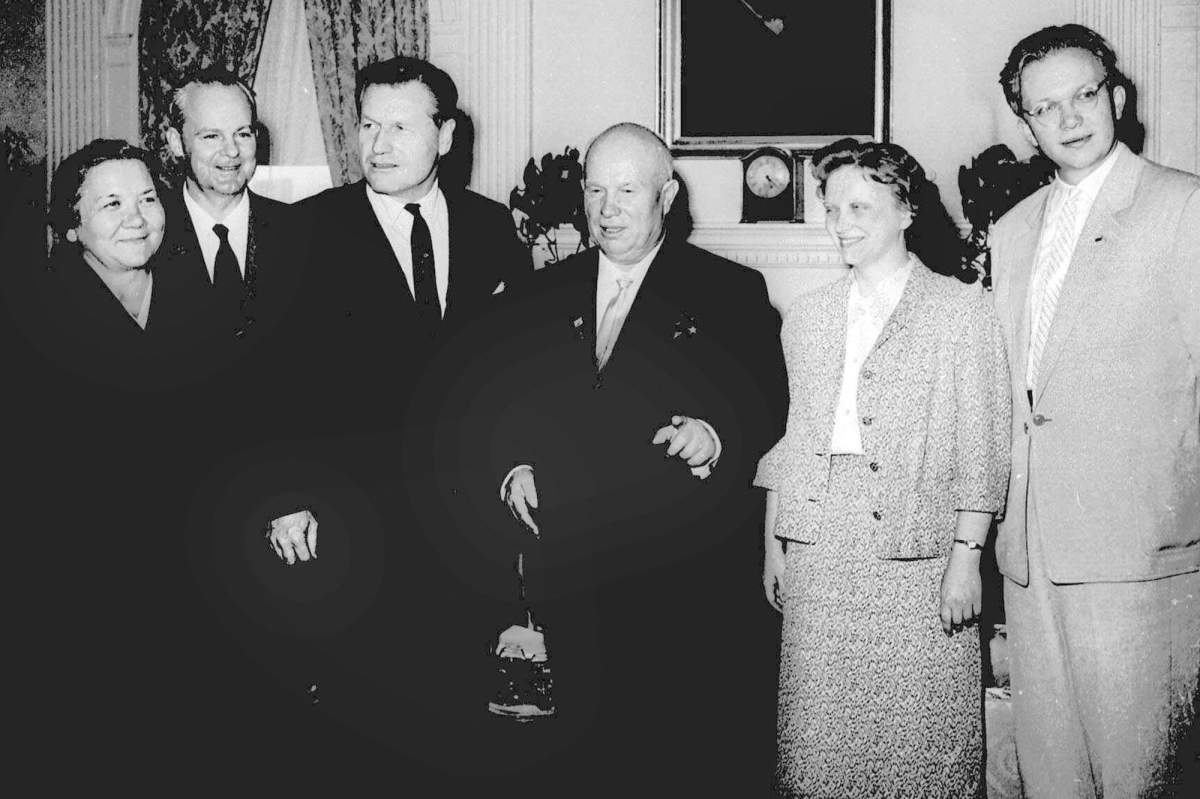 FILE - In this Sept. 18, 1959, file photo, then-New York Gov. Nelson Rockefeller, third from left, and Soviet Premier Nikita Khrushchev, fourth from left, pose during the governor's visit to the premier's suite in New York's Waldorf-Astoria. From left, are: the premier's wife, Nina, Soviet Ambassador to the U.S. Mikhail Menshikov, Gov. Rockefeller, Rada Adzhubel, the premier's daughter, and Sergei Khrushchev, far right, the premier's son. Sergei Khrushchev died Thursday, June 18, 2020, at his home in Cranston, Rhode Island. He was 84.