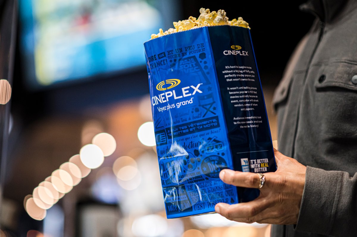 Customers buy popcorn at a Cineplex theatre in downtown Toronto on Wednesday, Aug. 26, 2020. THE CANADIAN PRESS/Christopher Katsarov.
