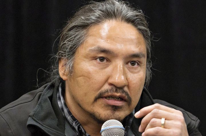 Chief Allan Adam of the Athabasca Chipewyan First Nation speaks during a press conference in Fort McMurray, Alta. on Friday May 30, 2014.