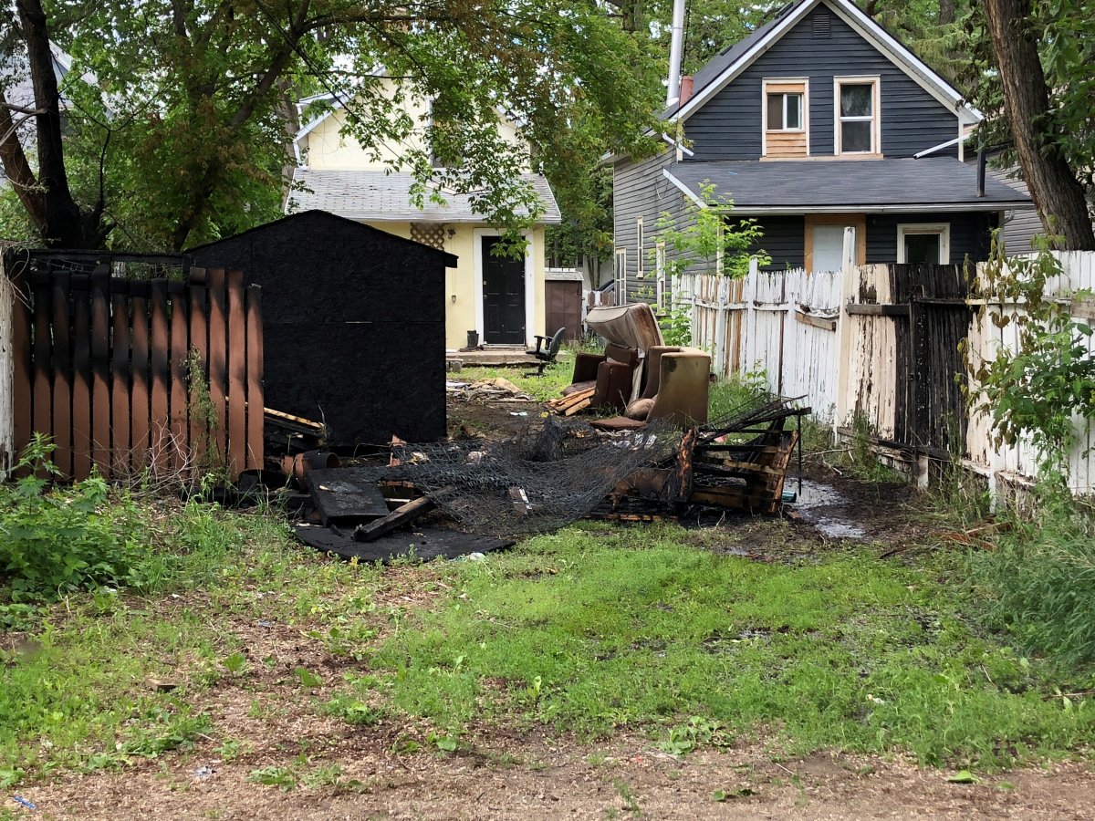 Saskatoon firefighters extinguished a fire in the backyard of a house on Avenue I South on Sunday afternoon.