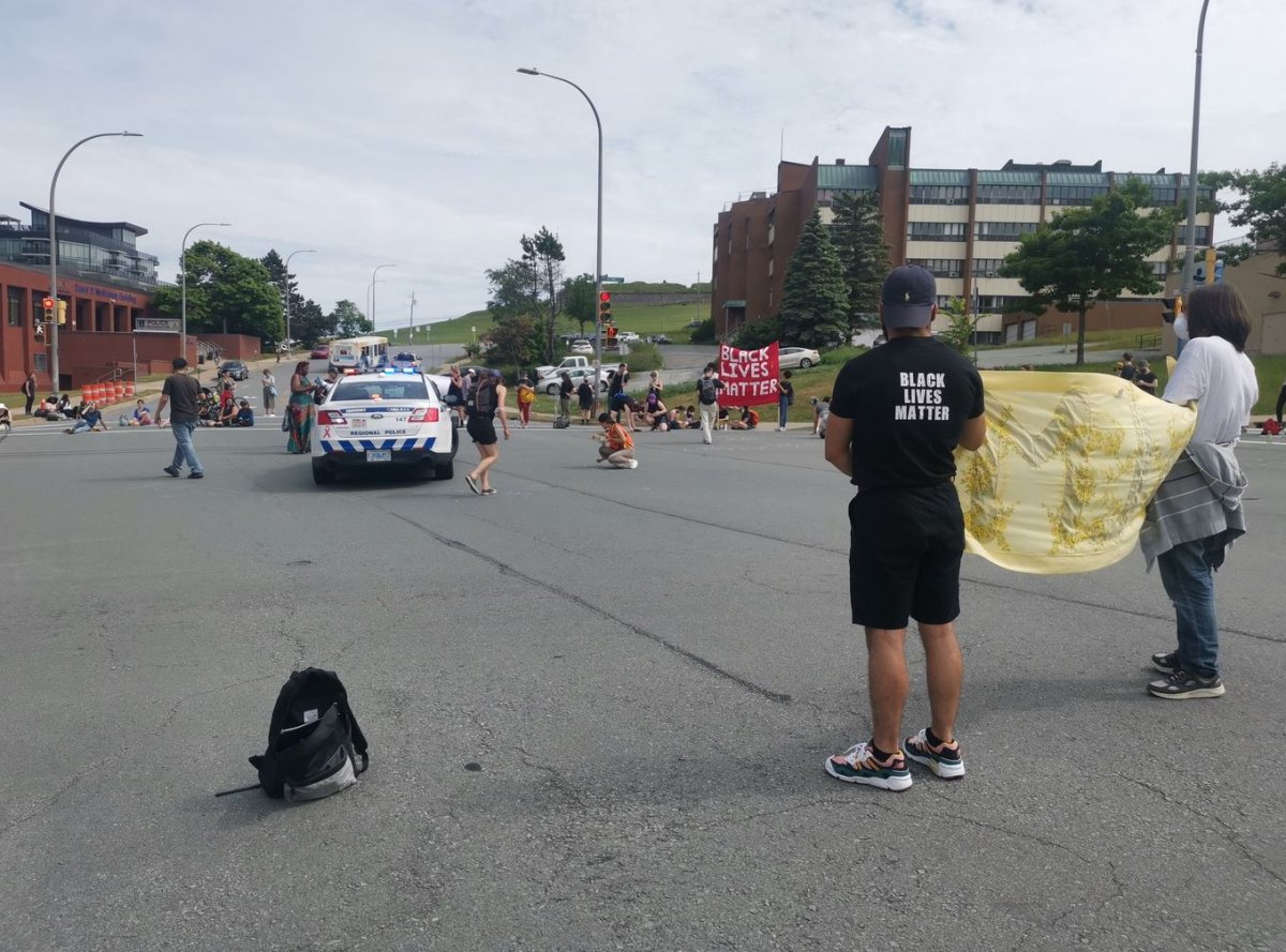 Demonstrators gather for a Black Lives Matter sit-in in Halifax on Friday, June 26, 2020. 