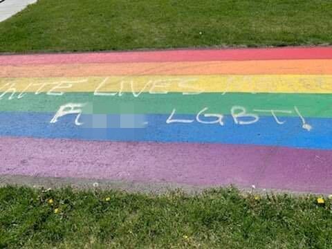 Vandalism on the Airdrie Pride sidewalk from the weekend of June 20, 2020.