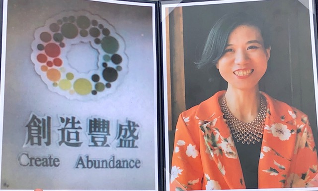 41-year-old Bo Fan is shown alongside the Golden Touch / Create Abundance logo.