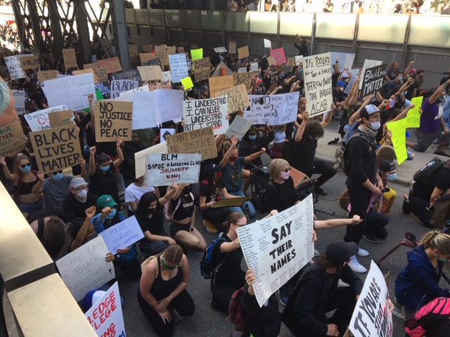 Protesters march through Calgary in an anti-police violence and anti-racism protest on Wednesday, June 3.