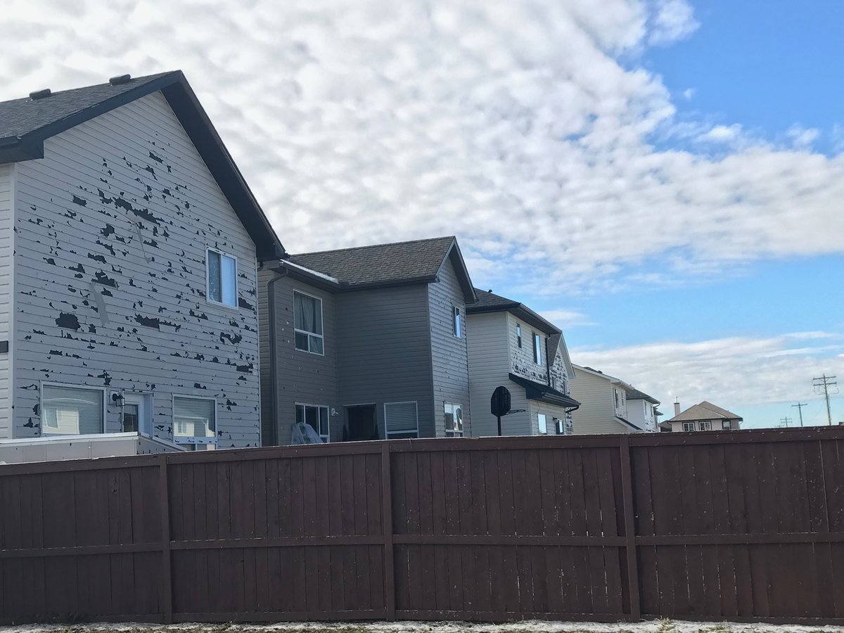 Hail damage to a home in Saddleridge in northeast Calgary.
