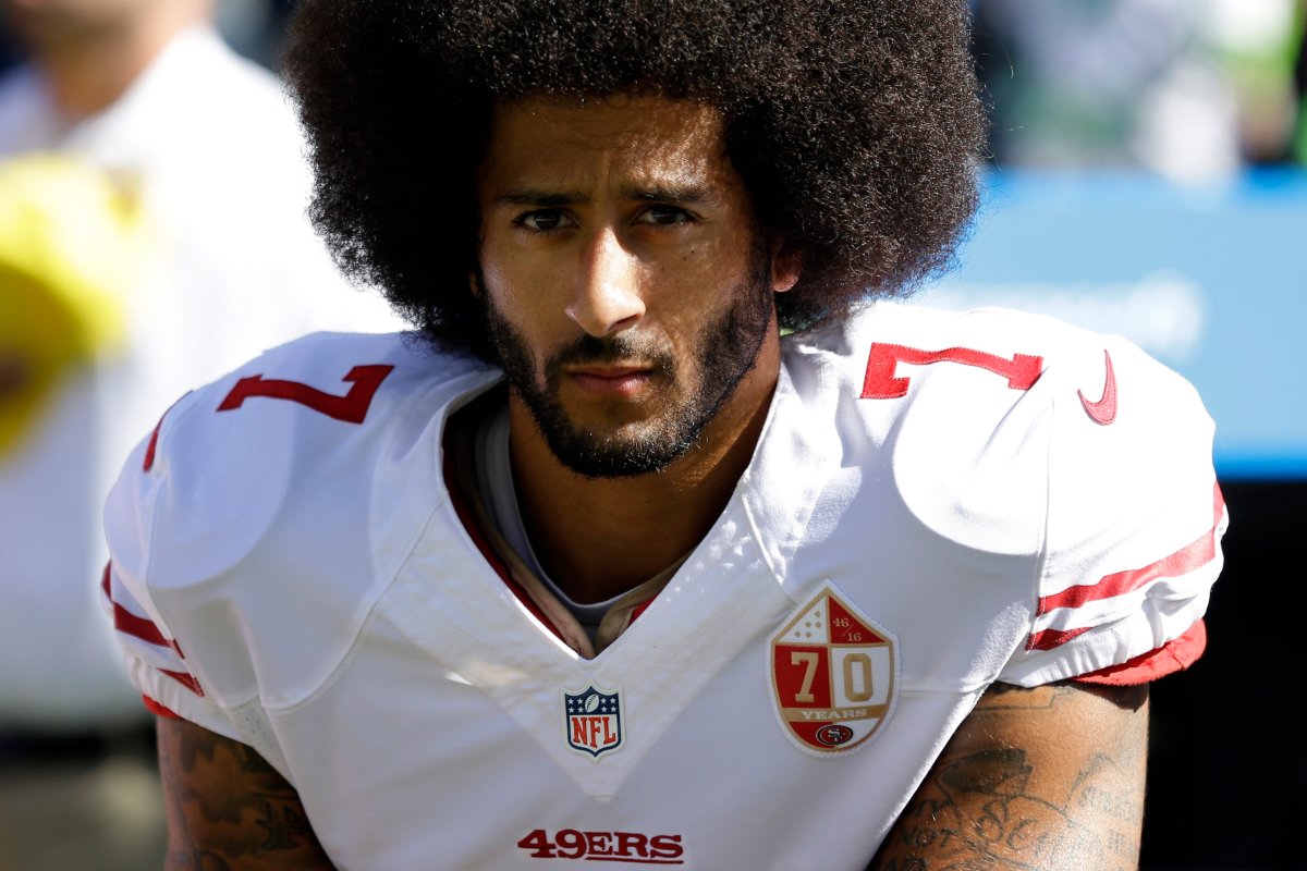 In this Sept. 25, 2016, file photo, San Francisco 49ers quarterback Colin Kaepernick kneels during the national anthem before a game against the Seattle Seahawks.