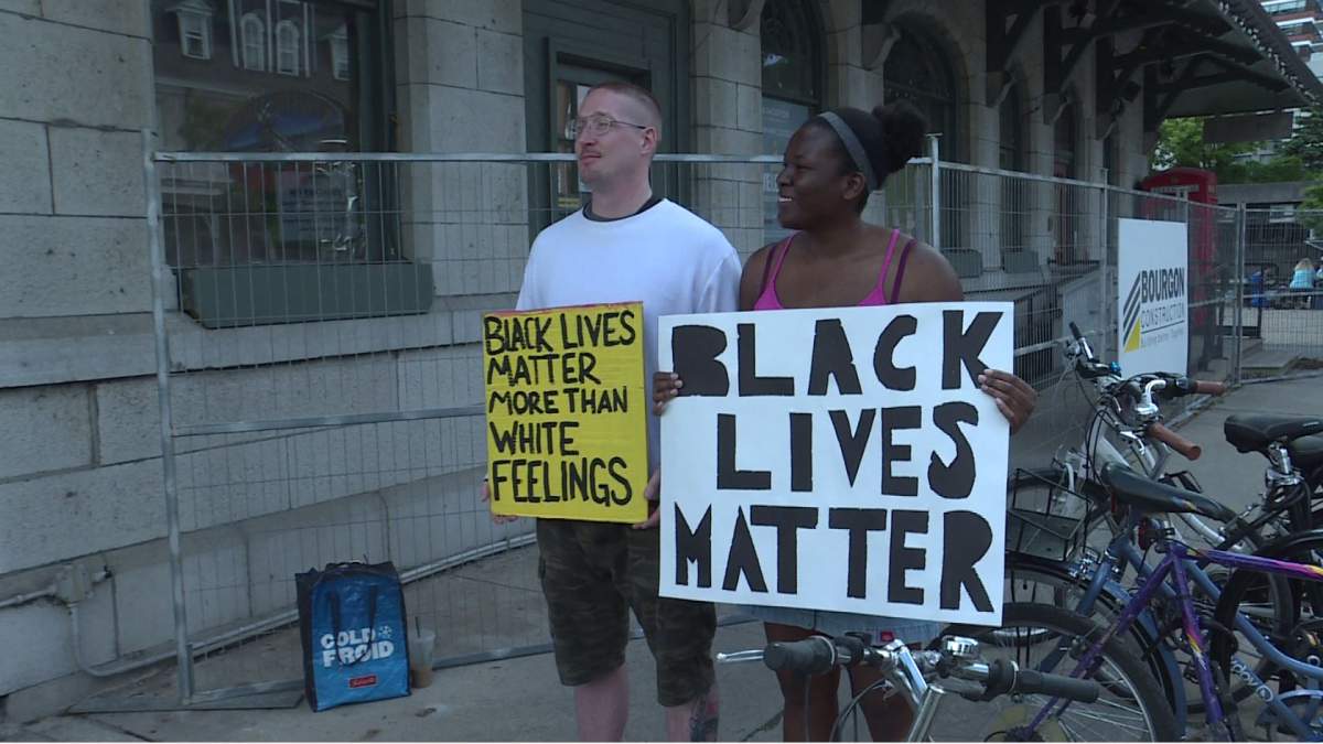 Shereece Allen with her boyfriend Mark Manuel attend the vigil at Confederation Park