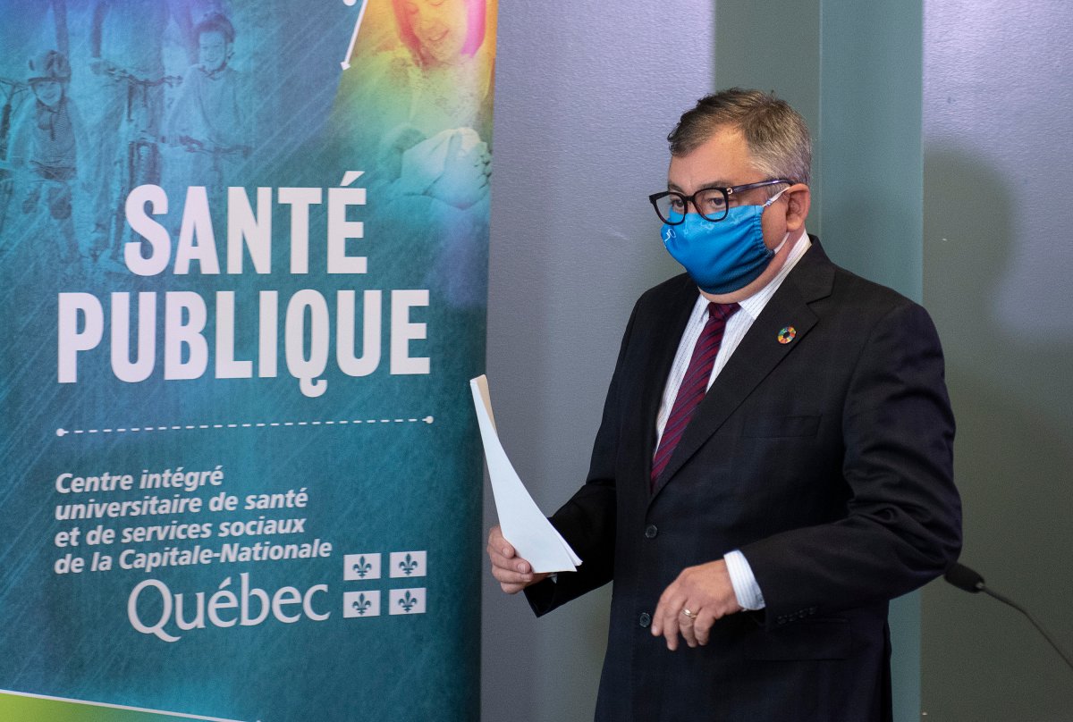 Horacio Arruda, Quebec director of National Public Health walks to a news conference on the COVID-19 pandemic, Monday, June 29, 2020 in Quebec City. 