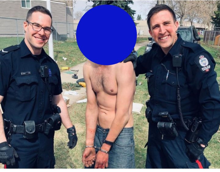 A photo posted to Instagram that shows two smiling police officers holding a man being detained will now be investigated, the Edmonton Police Service told Global News on Wednesday. Global News has slightly altered the Instagram post in an attempt to better conceal the man's identity.