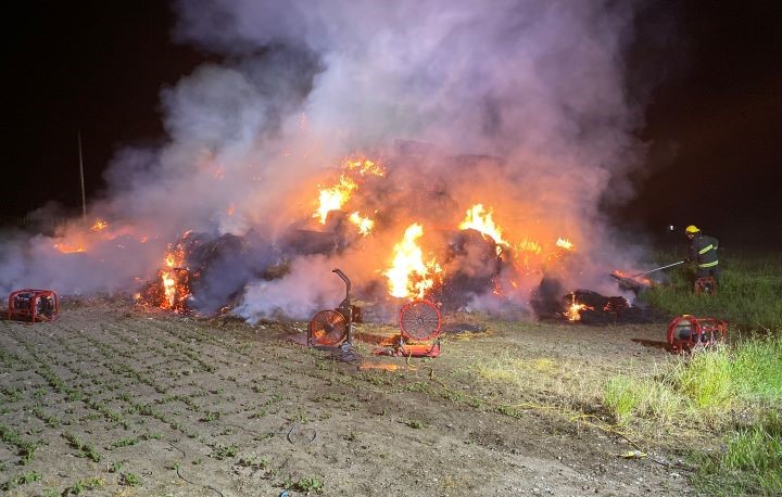 Clearview, Ont., fire crews battled a straw bale fire during the early morning hours of Tuesday on Fairgrounds Road North, in between Stayner and Nottawa.