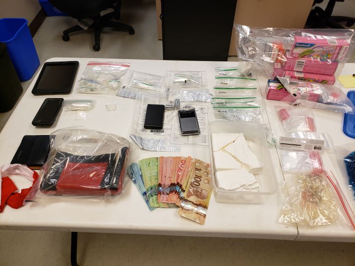 Officers executed a search warrant at a residence on Shannon Street, which resulted in the seizure of a large amount of cocaine, cash and other items that police say are "consistent with drug-trafficking.".