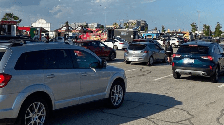 Cars line up at the food truck festival outside of Yorkdale Shopping Centre. 