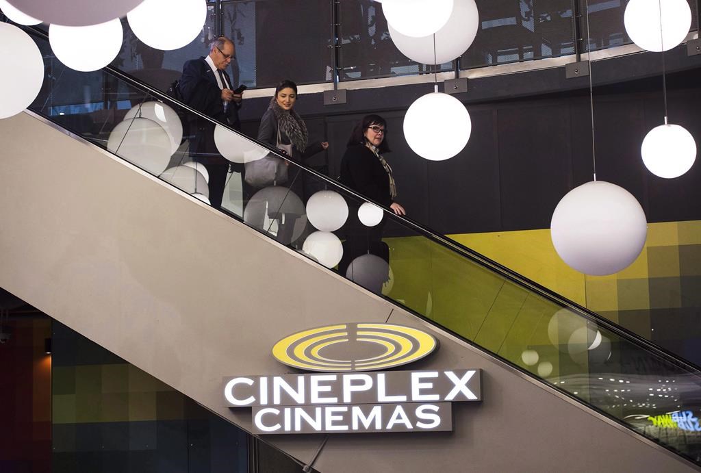 People leave a Cineplex theatre in Toronto on Friday, November 4, 2016.